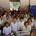 Visiting one of the many stalls at Wat Pah Pong that offered free food. This one was in support of the new monastery being set up in Norway.