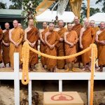 The sangha overlook the foundation stone repository.