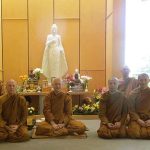 Ajahn Kalyano (center) with resident and visiting sangha.