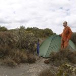 Ajahn Thitasippo setting up his tent.