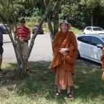 Katie Sita Trevor Chris Buddhisaro and Thitasippo waiting in the shade ready to explore the Waikato River.