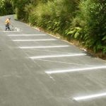 The carpark gets some white stripes.
