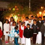 Kids from the Tawa dhamma school stand infront of their Vesak lanterns. A bright lot indeed - kids and lanterns.