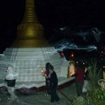 Circumambulation of the stupa under the full moon of Vesak. The incense the candles the lights of Stokes Valley in the distance. Nice.