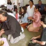 Ajahn Kusalo receives a blessing in Palmerston North.