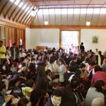 The crowd gathering in the sala ready to begin the New Year festivities.