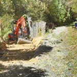 Work begins on taking out the crown of the of the loop track just below the upper house.