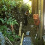 Cameron preparing the foundations for the dana table store. Tidiness is next to the fire hose.