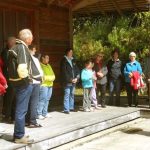 Ajahn Kusalo chatting with a group of visitors from St. Francis Xavier church.