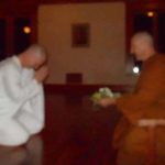 Colin offering a tray of flowers candles and incense to Ajahn Kusalo prior to requesting the Anagarika precepts.<br /><br />Sadhu! Sadhu! Sadhu!