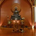 Anagarika Colin takes his place with the Sangha.