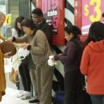 Alms round in the Palmerston North shopping mall.