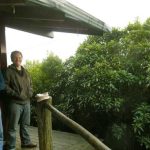 Richard and Colin get ready to open up the view from the topmost kuti.